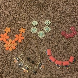 5 statement necklaces, one pair of earrings